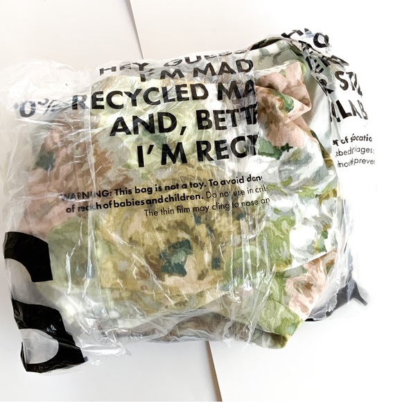 ASOS DESIGN Halter mini dress with bow back in floral print - Picture 13 of 14